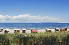 Timmendorfer Strand: Mondänes Seebad mit gemütlichen Charme. Der Blick über den Strand auf die Lübecker Bucht.