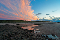 Wangerooge: Sonnenuntergang über die westliche Dünenlandschaft.